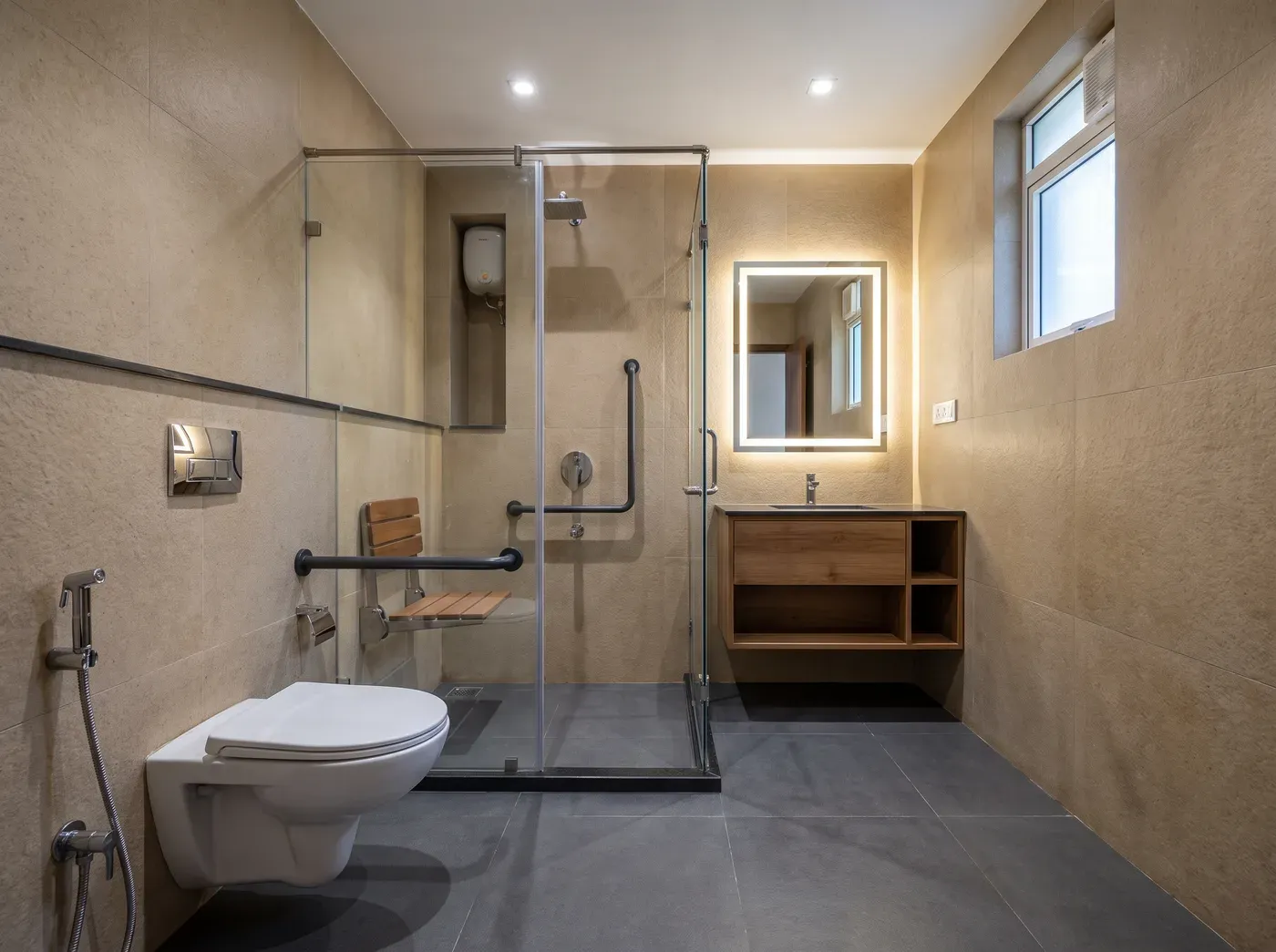 Calm Accessible bathroom — a design visualisation showing high-contrast functional details, anti-skid flooring, easy-reach storage and lighting planned for safer daily use.